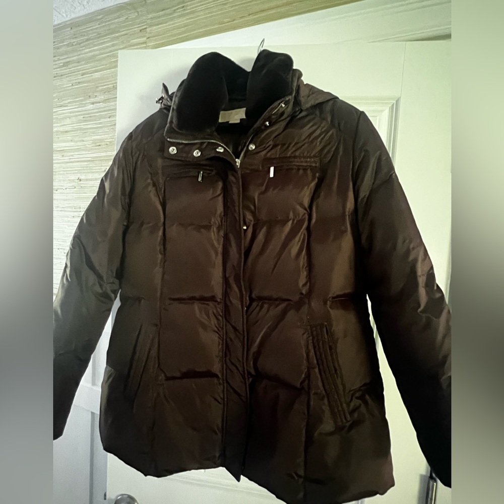 Woman’s Michael Kors puffer jacket.